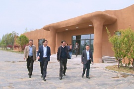 荆门市财政局局长王俊调研屈家岭国家考古遗址公园